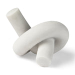 White marble knot sculpture on a white background