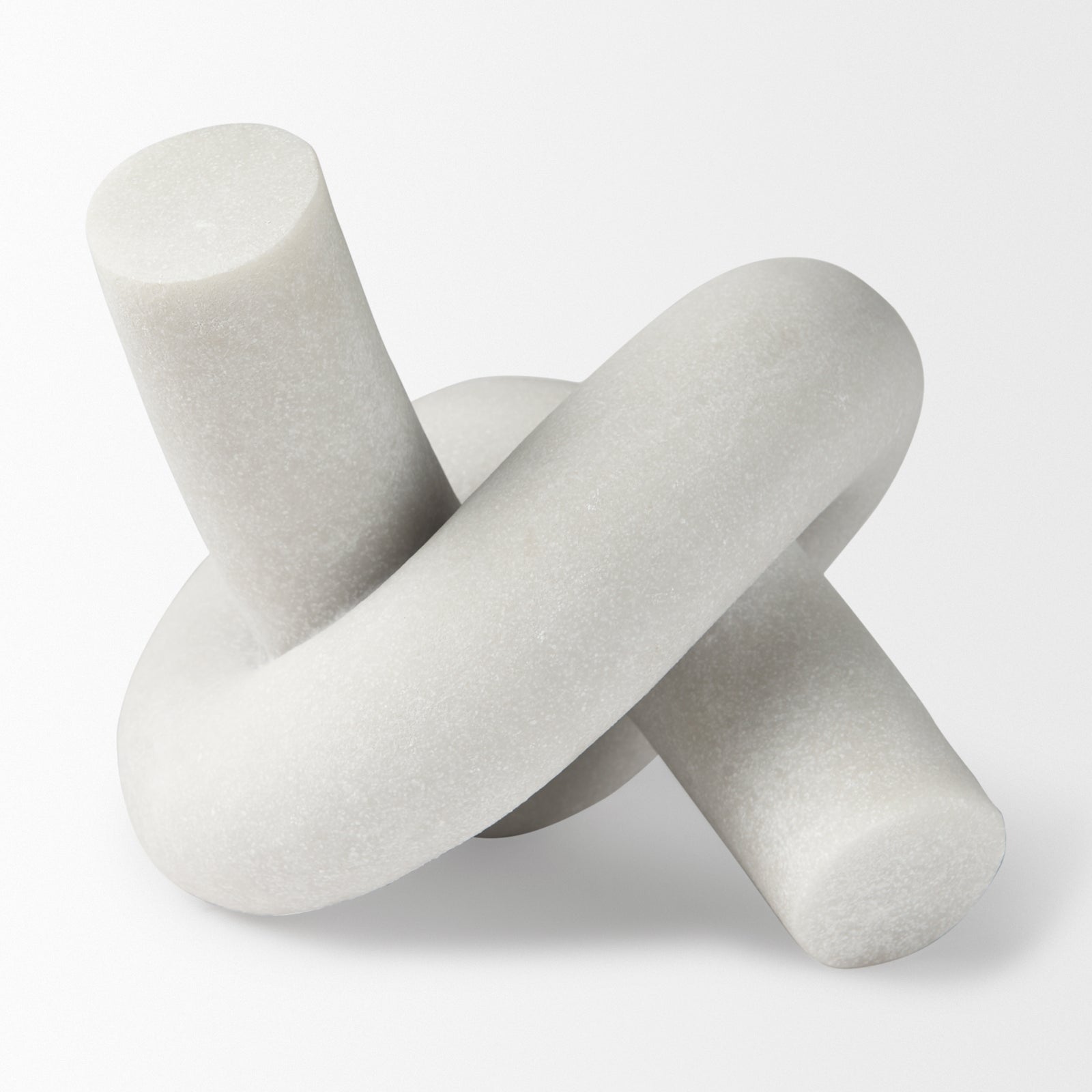 A small white knot sculpture made of cream granite resin, displayed against a plain background.