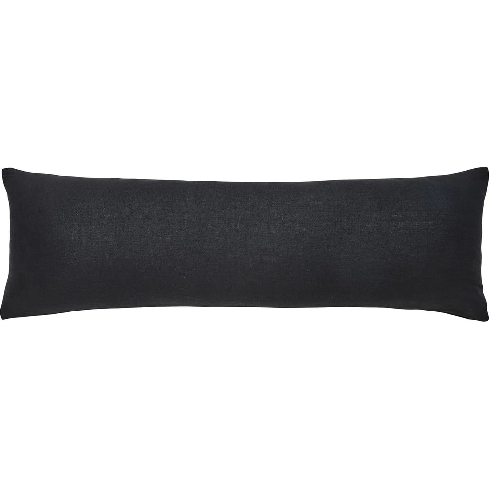 A black rectangular throw pillow with a shearling exterior, designed to fit a standard size pillowcase.
