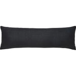 A black rectangular throw pillow with a shearling exterior, designed to fit a standard size pillowcase.