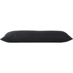 A black rectangular throw pillow with a shearling exterior, designed to fit a standard size pillowcase.