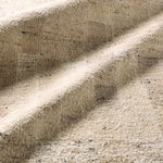 Close-up of textured beige fabric