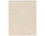 Light beige wool area rug with a hand-tufted texture