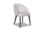 A white upholstered dining chair with a full back and seat, featuring dark brown wooden legs.