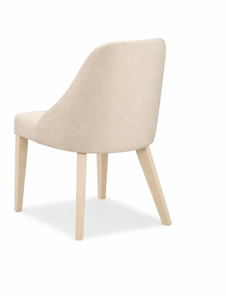 Beige chair with wooden legs on a white background