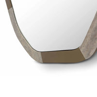 Round mirror with a metallic frame on a white background