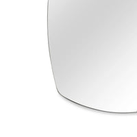 Close-up of a curved mirror on a white background