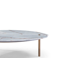 Round marble coffee table with a white and brown pattern on a white background