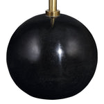 Black spherical lamp with brass fixture on a white background