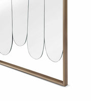 Close-up of a modern wall art piece with abstract design on a white background