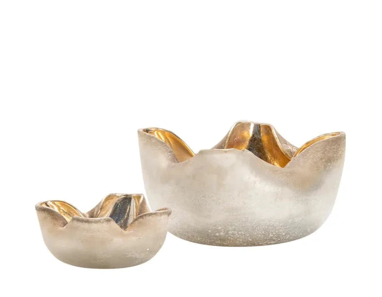 Two decorative bowls with gold accents on a white background