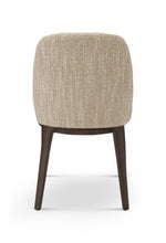 Beige upholstered chair with wooden legs on a white background
