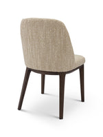 Beige upholstered chair with dark wood legs on a white background
