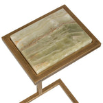 Small side table with marble top and brass frame on a white background