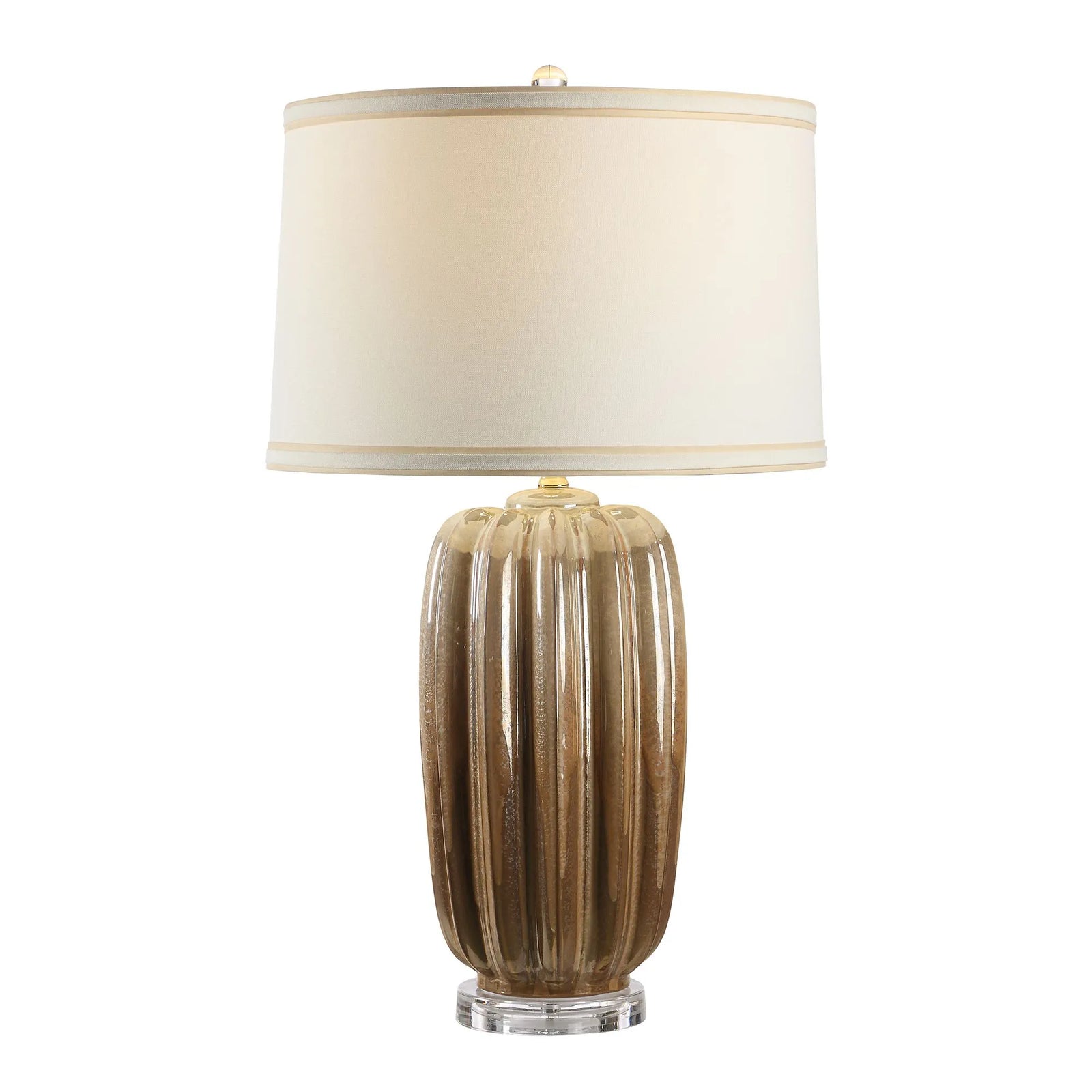 Table lamp with ribbed brown base and white shade on a white background