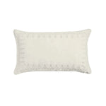 White decorative pillow with textured border on a white background