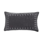 Dark gray pillow with decorative pattern on a white background