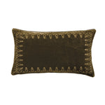 Brown pillow with decorative border on a white background