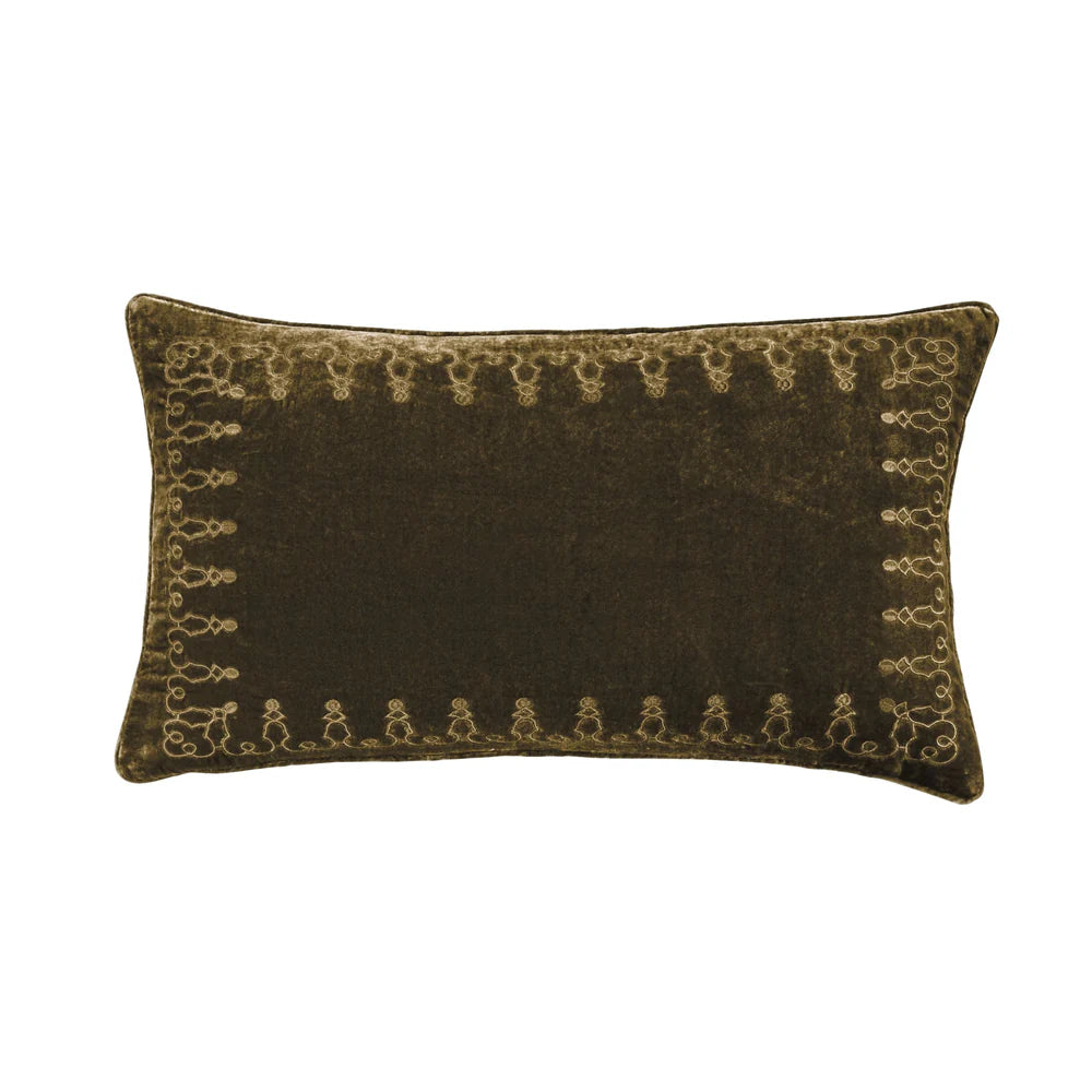 Brown pillow with decorative border on a white background