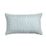 Light blue decorative pillow with textured pattern on a white background