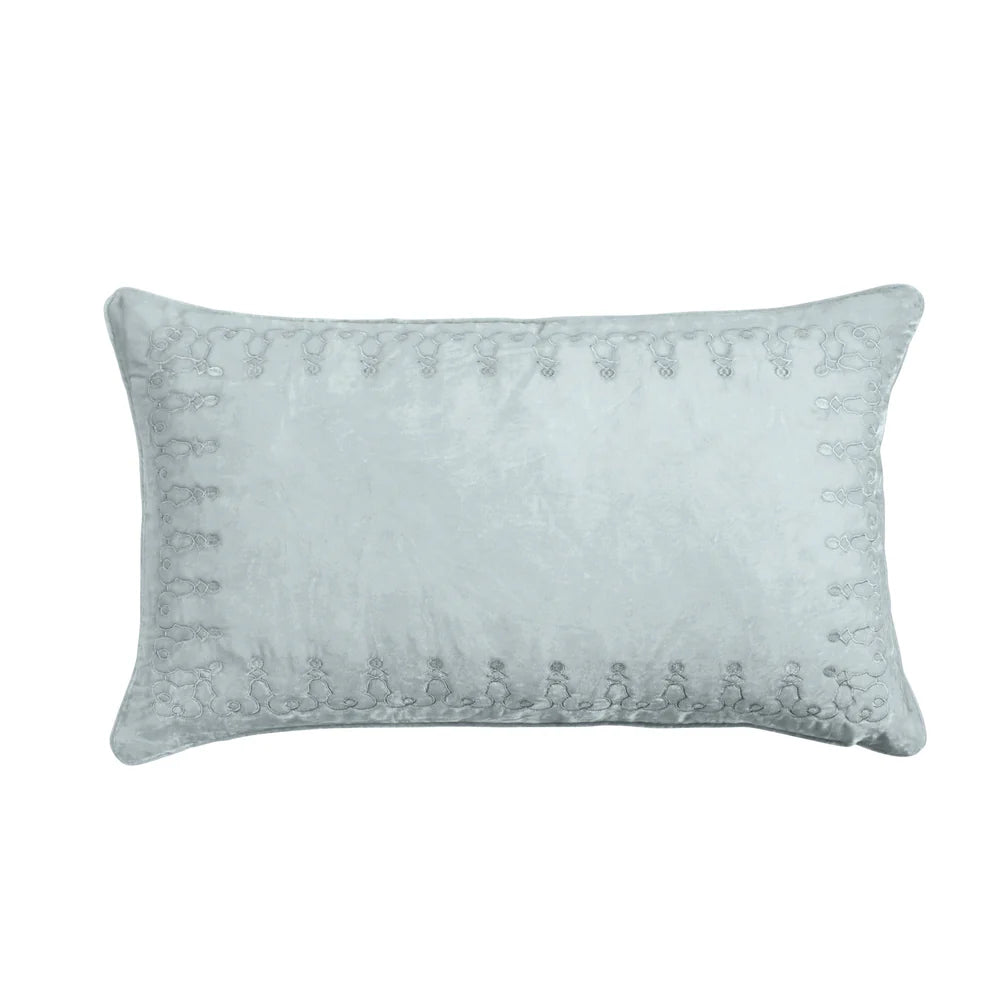Light blue decorative pillow with textured pattern on a white background
