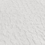 Close-up of a textured white surface