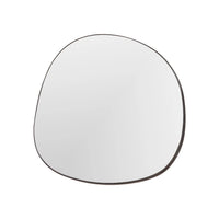 Round mirror with a black frame on a white background
