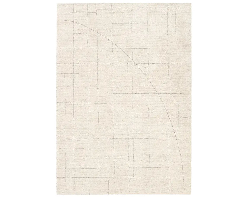 A beige area rug with a geometric pattern.