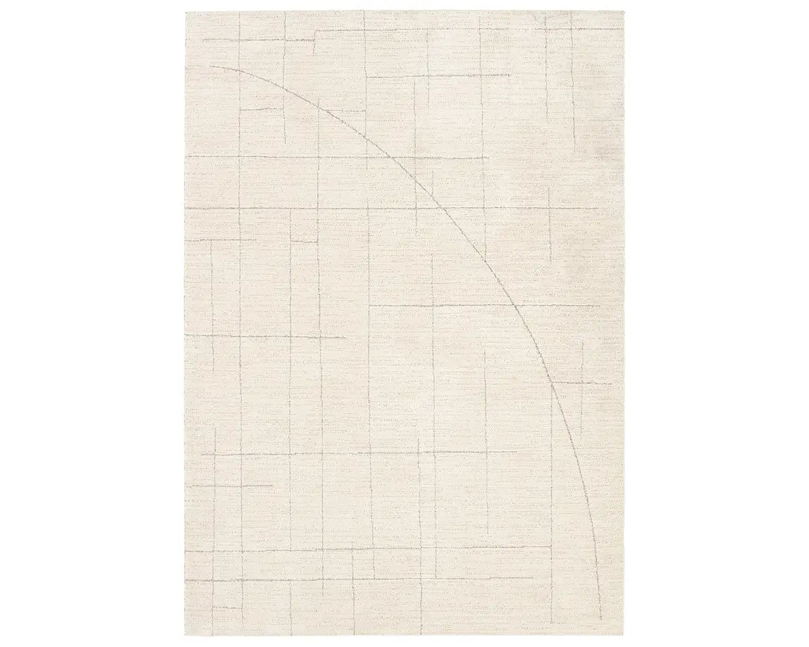 A beige area rug with a geometric pattern.