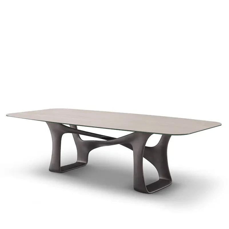 Modern coffee table with a unique base design on a white background