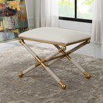 Decorative stool with gold accents on a patterned rug