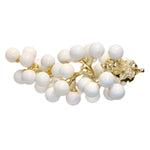 Pearl bracelet with gold clasp on a white background