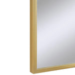 Rectangular mirror with a gold frame on a white background