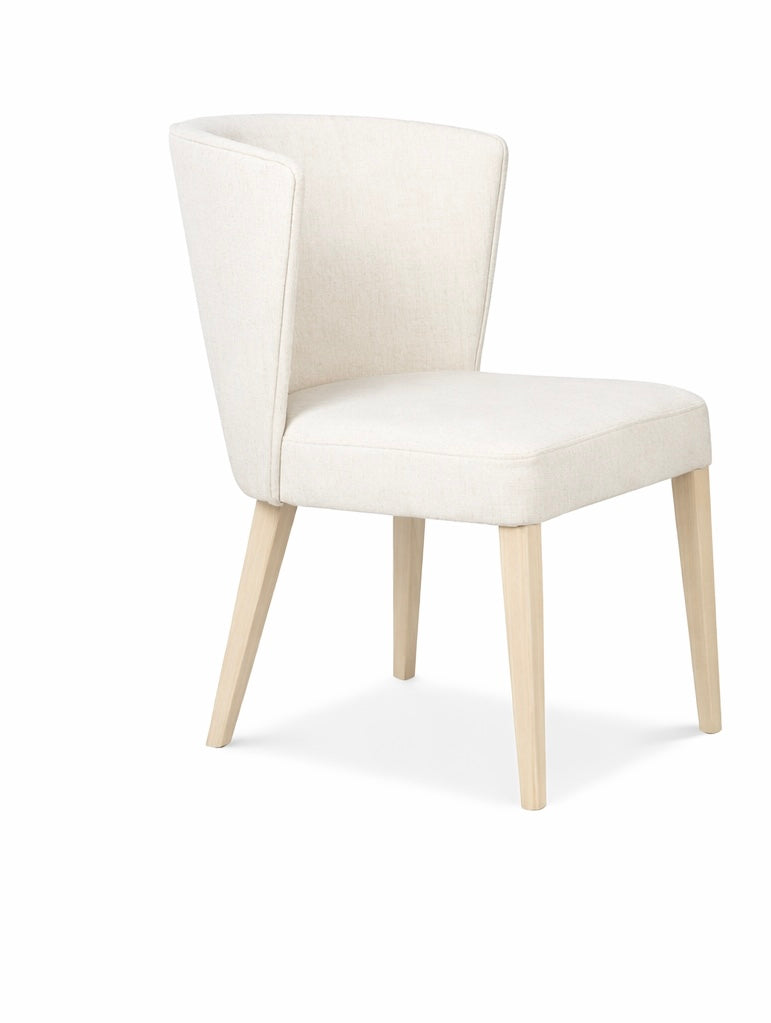 White chair with light wood legs on a white background