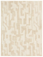 Beige area rug with geometric pattern on a white background