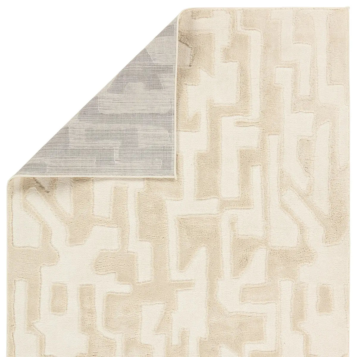 Beige and brown patterned rug on a white background