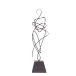A cast aluminum statues with an oil rubbed bronze finish on a black base, in a minimalist design, portraying abstract curvilinear forms.