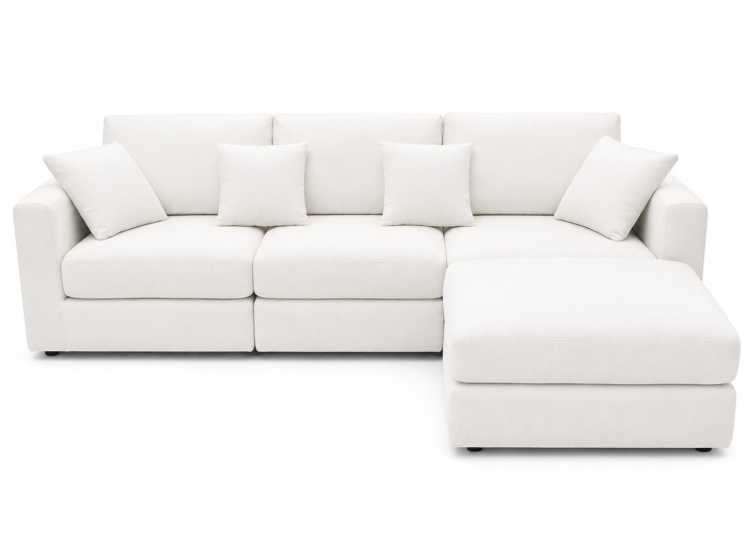 White sectional sofa with cushions on a white background