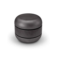 Black cylindrical container on a white background