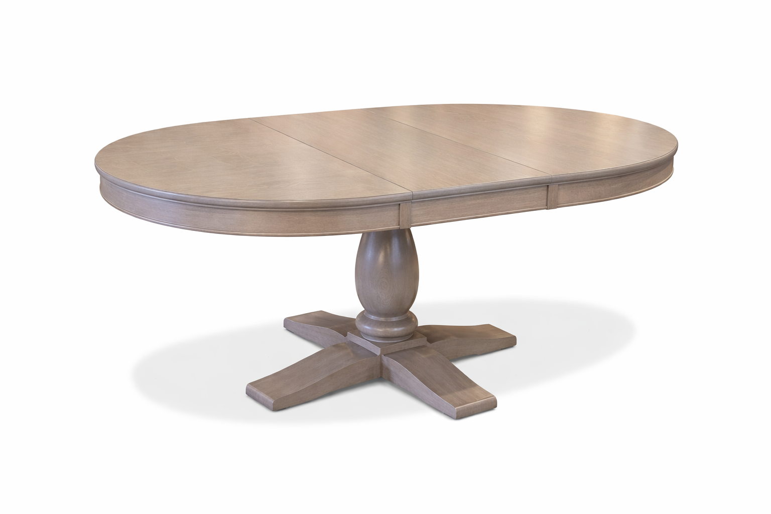 Wooden dining table with a round top and pedestal base on a white background