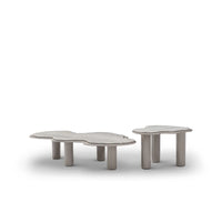 Two modern coffee tables with a unique design on a white background