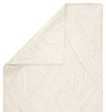 Beige textured rug on a white background