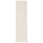 White textured rug on a white background