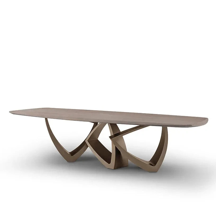 Modern coffee table with unique base design on a white background