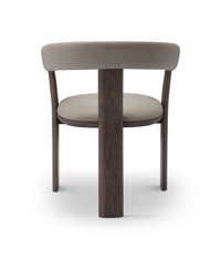 Chair with wooden legs and beige cushioned seat on a white background