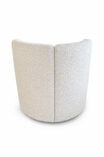 Textured white cushion on a white background
