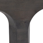 Dark wooden table with curved legs on a white background