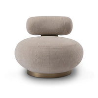 Beige armchair with a round base on a white background