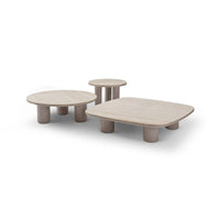 Three modern coffee tables on a white background