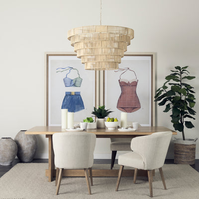 Dining room with wooden table, chairs, and decorative elements.